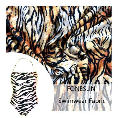 China Tiger Leopard Animal Pattern Print Stretch Designer Poly Lycra Swimwear Fabric for sale