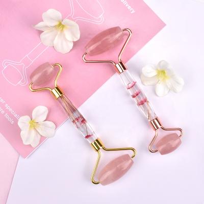 China Colorful Designs Wholesale Frame Facial Rose Quartz Pink Jade Roller Gua Sha Massage Roller Flower for sale