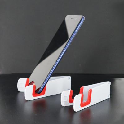 China Adjustable Promotional Logo Branding Plastic Tablet Desk Stand Mobile Phone Stand Support Holder for sale