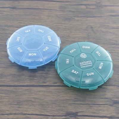 China Portable Plastic Pill Storage Box Customer Round Shape Weekly 7 Day Pill Storage Pill Box Medicine Pill Case for sale