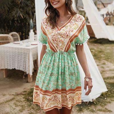 China New Women's Floral Dress Summer Boho Beach Mini Dress Fashion Breathable V-Neck Dress for sale