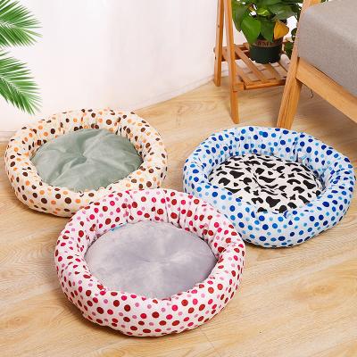 China Round Dog Bed Faux Fur Pet Bed Durable Comfortable Waterproof Plush Donut Dropshipping Soft Washable Cat Bed Removable Pet Cushion for sale