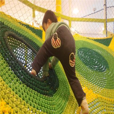 China Soft Maze Nylon Indoor Playground Equipment Theme Park Honeycomb Amusement Tunnel Rainbow Rope Net For Kids for sale