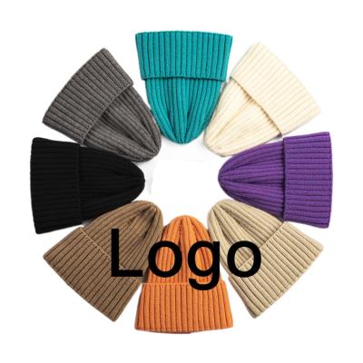 China COMMON Winter High Quality Plain Dyed Knitted Beanie Hats Custom Logo for sale