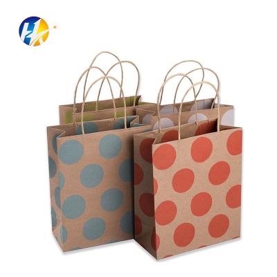 China Recycled materials sell custom logo kraft paper bag or white high quality cheaper wholesale paper bags for sale