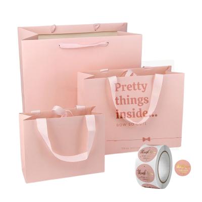 China LOGO Luxury Cosmetic Jewelry Wedding Small Large Custom Biodegradable Boutique Customer Shopping Bag Gift Medium Paper Bags with Ribbon Handles for sale