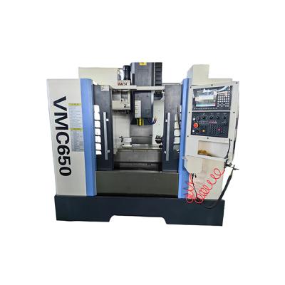 China Types of cnc machine cnc lathe machine controller vmc650 machining center building material stores used for sale