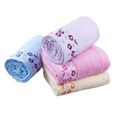 China Viable manufacturers the hotel direct selling word 100% cotton bath towels flowers towel for sale