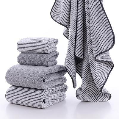 China Viable Chinese Bamboo Fiber Charcoal Manufacturer Bamboo Fiber Towel Velvet Bath Towel Plain Color Gift Set Coral for sale