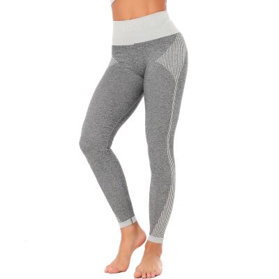 China Seamless knitted peach fitness pants moisture wicking exercise yoga pants show hip women fitness leggings for sale