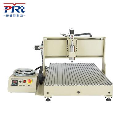 China PURUITEKEJI 6090GZ-1500W Metal Round Rail Engraving Machine 4-Axis CNC Router Carving Milling for sale