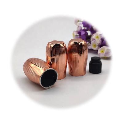 China Non Spill Wholesale Cosmetic Plastic Nail Polish Cover C35D234 Gold Package Nail Polish Metallic Pink Cap UV Plating Cap for sale