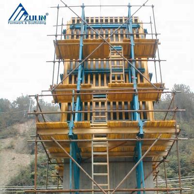 China Pillars crane-lifted formwork structure-attached climbing system MF240 for bridge pylons and high buildings for sale