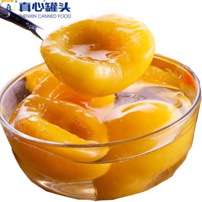 China Canned Zhenxin Canned Fresh Yellow Peach In Syrup With Best Price Can Peach for sale