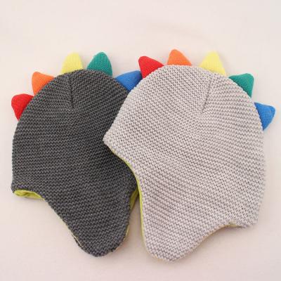 China JOINT New Design Cute Dinosaur Knit Hat Hearing Protection Knit Hat For Kids for sale