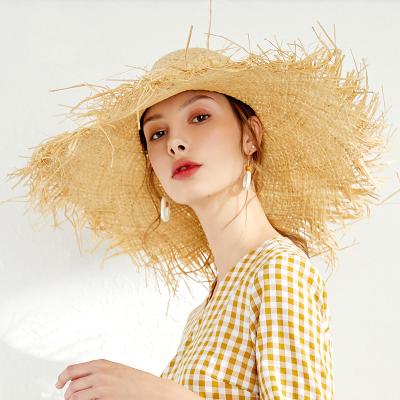 China Natural Character Madagascar Raffia Weave Bell Style Color Beach Resort Sunscreen Straw Hats for sale