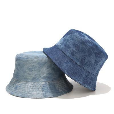 China Fashionable style unisex reversible bucket hat indigo dye tie character denim comfortable OEM hat for sale