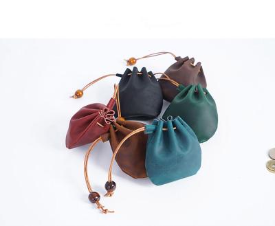 China Vintage Anti-theft Men's Wallet 2021 New Mini Coin Purse Women' S Drawstring Leather Wallet for sale