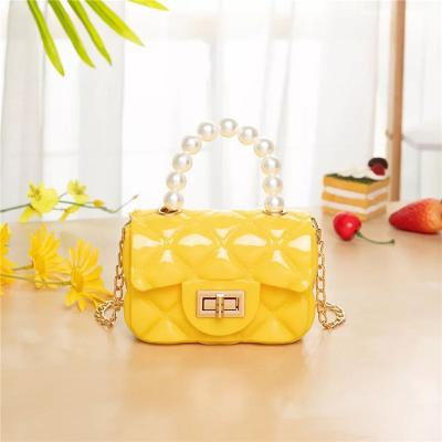 China 2021 New Waterproof Jelly Bag Women's Shoulder Bag Candy Color Children's Handbag With Gold Chain for sale