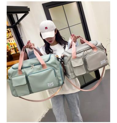 China Autumn New Style Hand Luggage Bag Large Capacity High Quality Sports Bag Weekend Fitness Yoga Bag For Women for sale