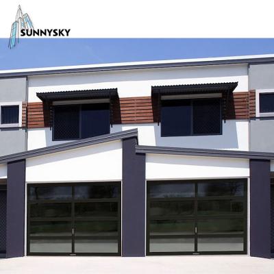 China Anti Theft Customize Automatic Large Overhead Motorized Garage Sectional Glass Door for sale