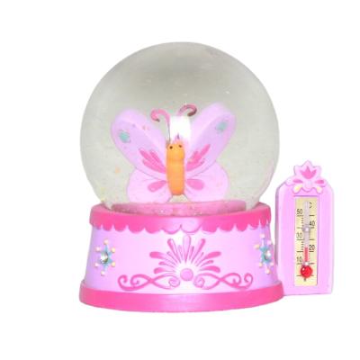 China Custom World Snow Globe Butterfly Figure Design Snow Ball With Temperature Measurement Home Decor Souvenir Resin Water Globe for sale