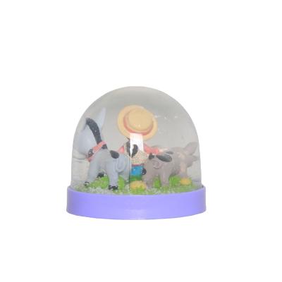 China World Professional 80mm Cute Boy Pig And Donkey Animal Resin Inside Plastic Snow Globe for sale