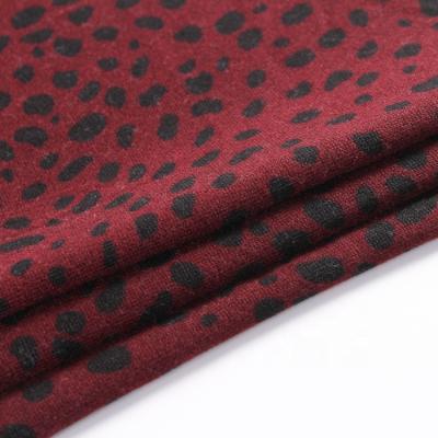 China Peach effect red and black polyester effect hacci sustainable stock black sweater knit fabric for sale