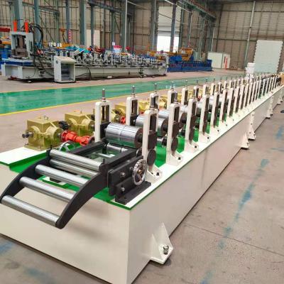 China Factory 55/77 PU Foam Roller Shutter Door Machine PU Foam Roller Shutter Slat Roll Forming Machine for sale