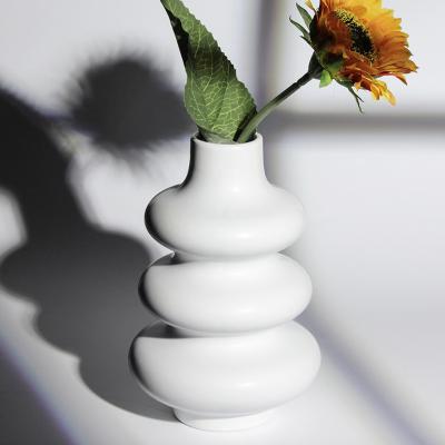 China Nordic Ins Cute Heterosexual LOGO Wholesales Ceramic Vase Custom Made Hydroponic Environment-Friendly Ceramic Vase Circle for Home Decoration for sale