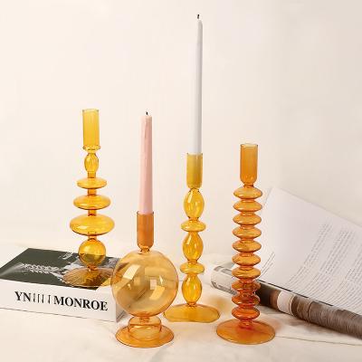 China Nordic Orange CIO Home Decor Crystal Candlestick Holder Nordic Candelabro Porta Velas De Cristal Amber Glass Candle Holders Trending Vintage Art for sale