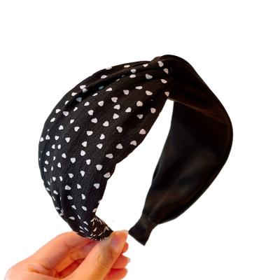 China Simple and fashionable hair accessories pop out hair accessories all-match polka dot cross-style head band for sale