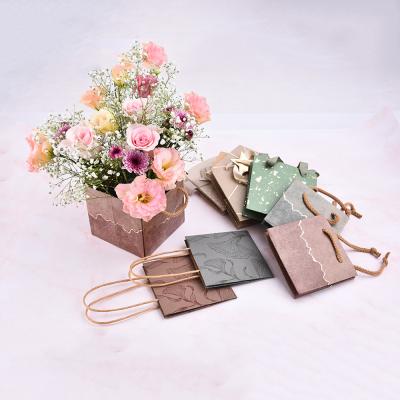 China Recyclable Wholesale Custom Paper Flower Bouquet Gift Carrier Bags for sale