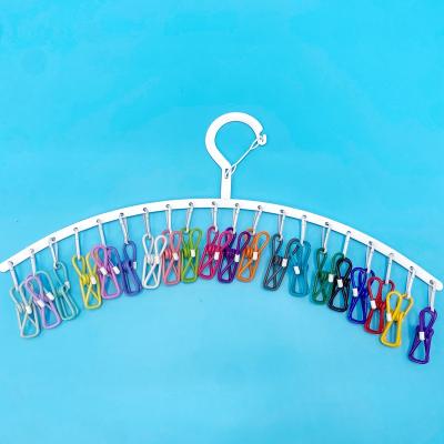 China Behind Doors/On Walls Shengbao Device Factory's new products are hot and popular, and the arc clothes rack is 20 color clips, drying photos, o for sale