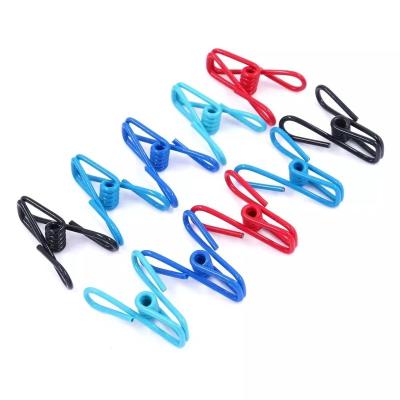 China Behind Doors/On the walls spring clothes clips are used for socks, photos and clothes. They are practical and convenient to carry for sale