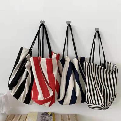 China Latest Oversized Beach Striped Shoulder Bag For Girls Women Girls Tote Bags New Sun Summer Navy Canvas Shopping Handbag 2021 for sale