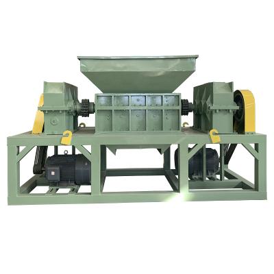 China Plastic Film Scrap Wooden Pallet Metal Bottle Rubber Tire Recycling Plastic Crusher Double Shaft Shredder Machine for sale