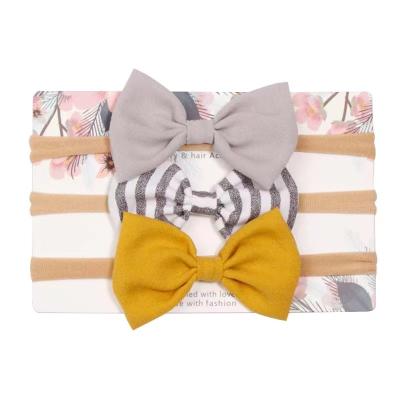 China 2021 Kids Friendly Handmade Nylon Baby Bow Material Newborn Flowers Set Toddler Baby Hairband Elastic Bow Knot Cotton Accessory Small for sale