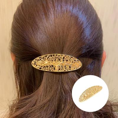 China Environmentally Friendly Popular American European Cavity Vintage INS Hair Pin Women Geometrical Gold Metallic Carving Tree Of Life Barrettes For Girls for sale