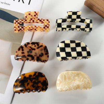 China Environmentally Friendly Geometric Black And White Plaid Clips Acetate Hair Women Hair Claw European And American Popular Handle Acrylic for sale