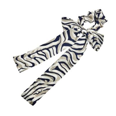 China 2021 Fashion Girl's Ribbon Bow Hair Scrunchies Long Tail Ties Zebra Leopard Cow Scarf Scrunchies Animal Printing Hair Ties for sale