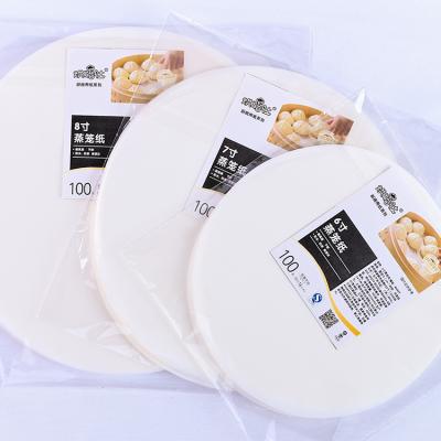 China Waterproof And High Temperature Resistant Oilproof White Round Greaseproof Double Sided Silicone Oil Steamer Paper for sale