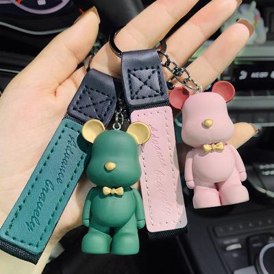 China Durable Creative Cute Nordic Building Block Bear Bow Tie Bear Silicone Alloy Key Chain for sale