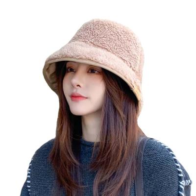 China breathable & Custom Made Logo Fuzzy Fluffy Hat Raincoat Reversible Raincoat Women Winter Bucket Hat for sale