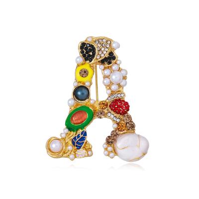 China Factory Direct Sale High Quality Environment Friendly Unique Design Simulated Pearl Letter A Brooches For Women Girls Hats Bags Decor Jewelry for sale