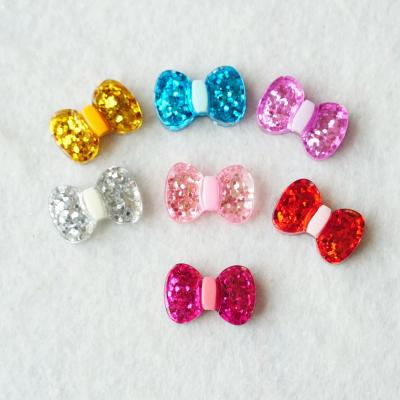 China Beautiful Europe 200Pcs/Bag Resin Flat Back Bows Acrylic Charm For Jewelry Making Or DIY Crafts for sale