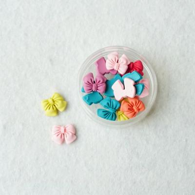 China 200Pcs/Bag Europe Resin Charm Bow Cabochon Flat Back Embellishments For Craft Scrapbooking Jewelry Making for sale