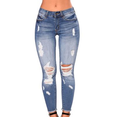 China Breathable High Waisted Stretch Ripped Womens Jeans Grinding Worn Fashion Casual Denim Womens Pants for sale