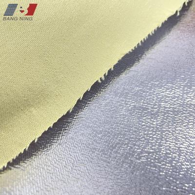 China Flame Retardant High Temperature Abrasion Resistant Bright Silver Non-Flammable Aramid Aluminum Foil Fabric For Workwear And Gloves for sale