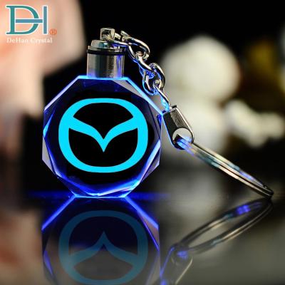 Cina Cheap Gifts Souvenirs Custom Car Logo Crystal LED Light Keychain in vendita